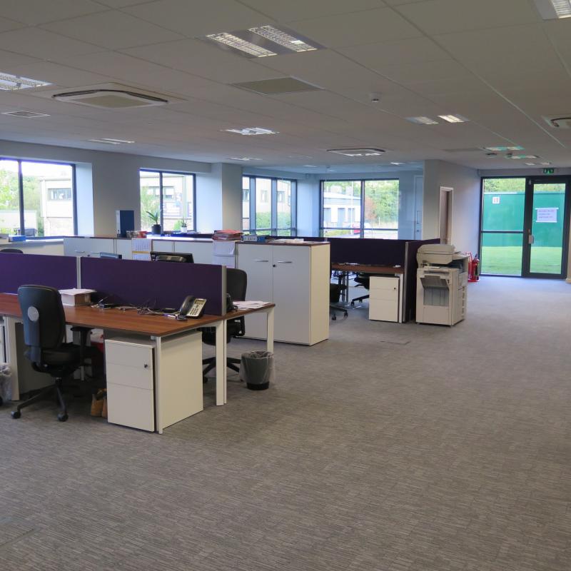 view of ground floor open plan office area with desks